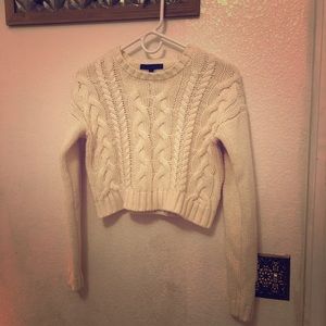 Cropped cable knit sweater